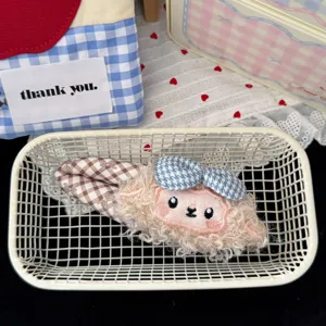 Cute plush sheep hair clip with houndstooth bow, sweet cartoon hair accessory for girls bangs.