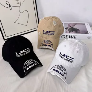 Distressed vintage baseball cap with heavy embroidery, casual street style cotton dad hat