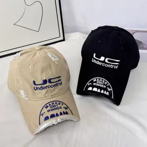 Distressed retro baseball cap with heavy embroidery, street style casual dad hat for men.