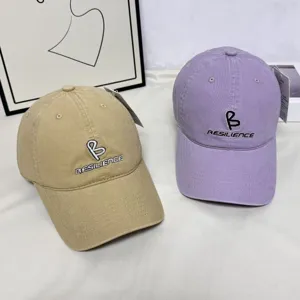 Korean letter embroidered baseball cap with wide brim, stylish casual sun hat for daily wear.
