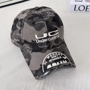 Distressed camouflage baseball cap with heavy embroidery, vintage street style fashion hat.