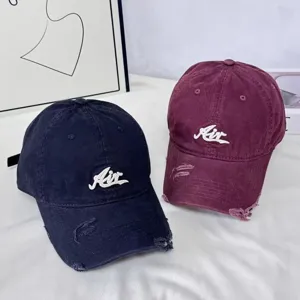 Waschung distressed Baseballcap mit Buchstaben Stickerei für optimalen Sonnenschutz.
