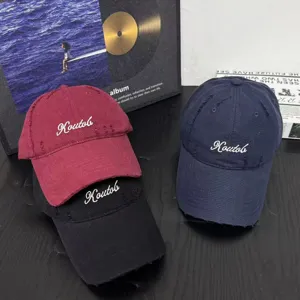 Distressed cotton baseball cap with wide brim, casual soft top dad hat for women and men.