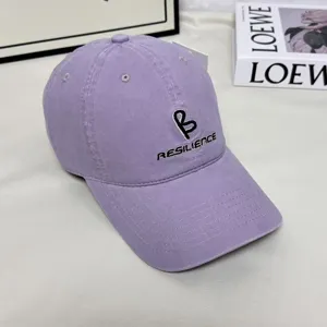 Purple baseball cap for women with letter embroidery and wide brim stylish casual hat.
