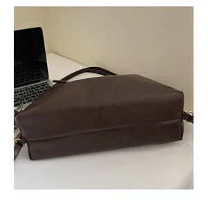 Dark brown large capacity shoulder tote bag detail view, casual style everyday handbag accessory