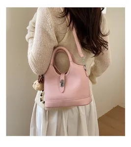 Korean style pink bucket bag for women, luxury design PU leather shoulder handbag chic.