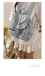 Zaino in nylon per studenti in stile coreano azzurro chiaro, ideale per viaggi e uso quotidiano.