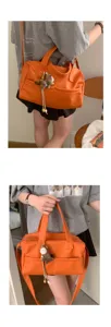 Borsa a tracolla arancione alla moda per donna, grande borsa a cuscino morbida per il lavoro quotidiano.
