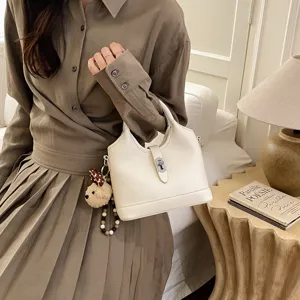 Chic Korean style bucket bag for women, elegant leather handbag, shoulder crossbody commuting bag.