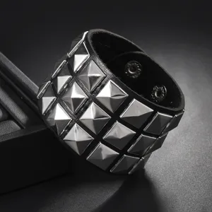Men's punk rock gothic black PU leather wide bracelet with three rows of metallic square pyramid studs.