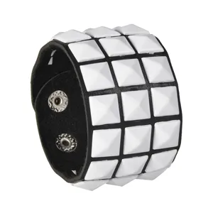 Punk style three-row pyramid stud wide black leather bracelet for men, cool cuff accessory.