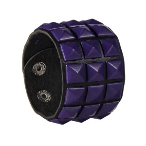 Close-up detail of a punk style triple row pyramid stud black leather wide bracelet.