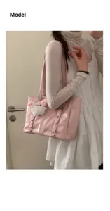 Pink patent leather tote bag for women, stylish casual shoulder bag with cute plush pendant.