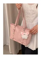 Pink PU leather tote bag, large capacity minimalist shoulder handbag for daily commute.