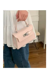 Rosa Handtasche mit Krokodilmuster, klassische Kelly-Stil Tasche mit silberner Hardware.