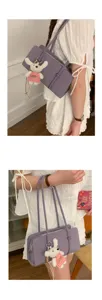 Chic purple underarm shoulder bag for women with cute plush rabbit pendant charm stylish.