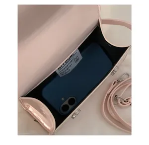 Rosa PU Leder Kelly Handtasche Innendetail zeigt Handy Aufbewahrung und schicken Schultergurt.
