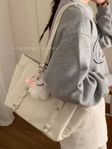 Korean style large capacity white tote bag, minimalist commuter shoulder bag for women daily use.