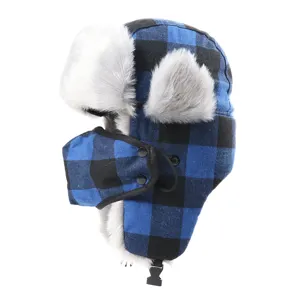 Blue black plaid trapper hat with furry earflaps and removable face mask for winter outdoor skiing.