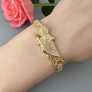 Detailed view of the stylish gold Cuban chain bracelet featuring dazzling crystal zircon portrait.