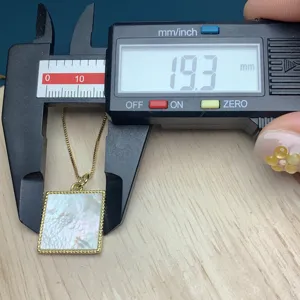 Natural white mother-of-pearl square pendant necklace detail showing size measurement.