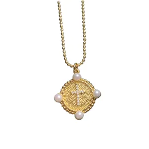Gold cross pendant necklace with rhinestones and pearls for women fashion jewelry.