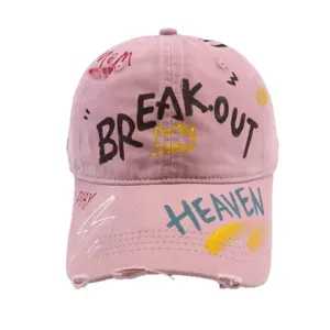 Pink distressed graffiti baseball cap for women, trendy casual cotton sun hat with cool letters.