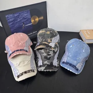 Korean streetwear baseball cap with embroidered wings and letter print, denim and camo styles.