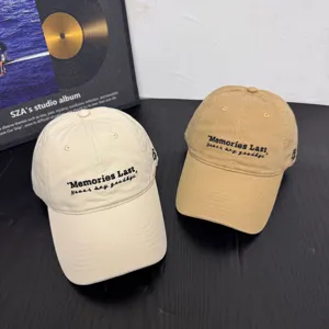 Close-up detail of stylish casual baseball caps with front embroidery, soft top design.