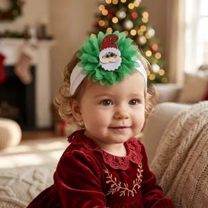 Christmas baby headband with green chiffon flower and cute Santa Claus detail, soft nylon band.