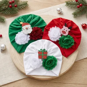 Christmas baby turban hat set with cute floral and cartoon holiday designs for newborns.