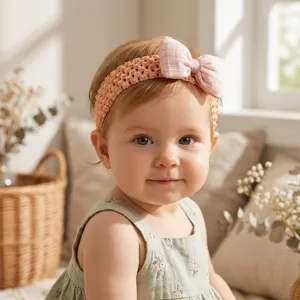 Cute summer baby headband with pink plaid bow, comfortable crochet design for little girls.