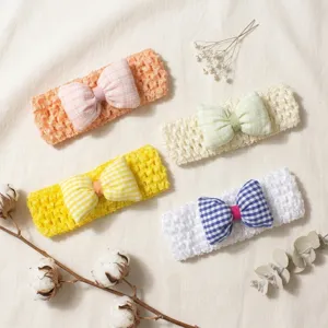 Cute baby hair band with plaid bow and soft hollow crochet design for daily wear.