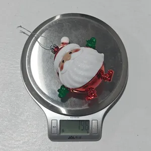 Christmas Santa Claus hanging ornament detail view showing glitter electroplating finish and size.