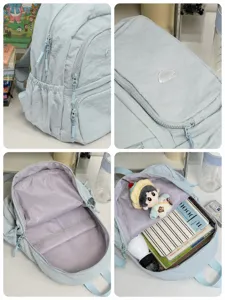 Minimalist light blue casual backpack with waterproof fabric, multi-compartments and large capacity.