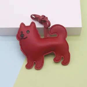Porte-clés chien en cuir rouge mignon chiot pendentif accessoire de sac dessin animé détail