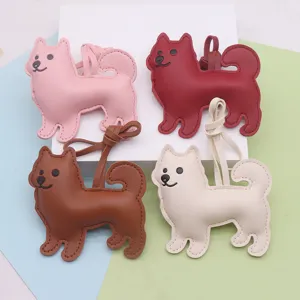Joli porte-clés chien en cuir mignon pendentif pour sac à main et accessoires de mode