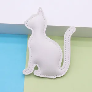 Minimalist white PU leather cat keychain, cute animal bag charm for keys and handbags stylish.