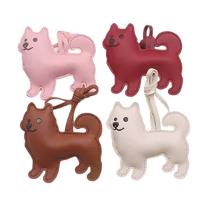 Charm de sac chien en cuir mignon, porte-clés pendentif chiot pour sacs à main de femmes.