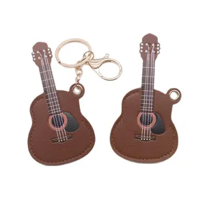 Creative PU leather guitar keychain metal ring bag charm music instrument pendant car accessory