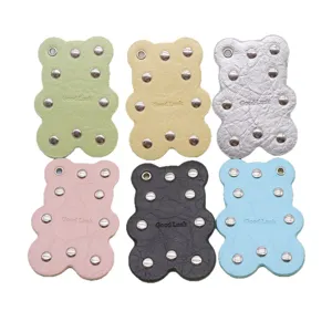 Cute bear leather keychain charm with metal rivets, multiple colors bag pendant accessory.