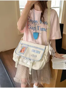 Japanese style canvas messenger ita bag with transparent window, cream and light blue color.