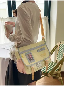 Japanese cute color-block messenger ita bag with clear window, stylish casual crossbody bag.