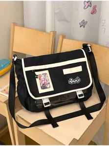 Japanese style contrast color messenger ita bag with transparent window for casual daily use.
