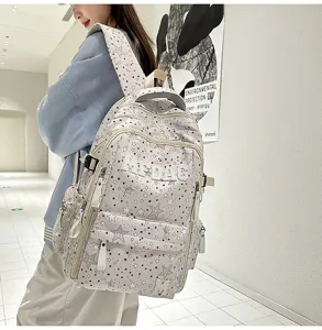 Trendy star printed canvas backpack for students, casual stylish school bookbag with multi pockets.