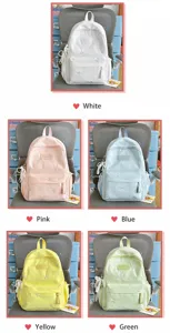 Detailed view of the cute pastel bow embroidered canvas school backpack in multiple color selections.