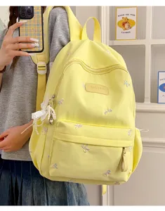 Yellow cute backpack with colorful bow embroidery and sweet pearl pendant for daily use