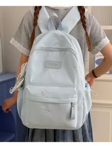 Light blue cute bow embroidered school backpack for women daily travel casual student book bag