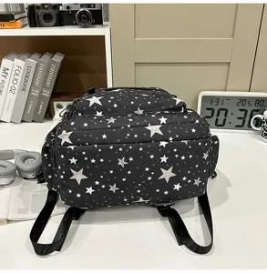 Casual star pattern backpack for daily use, school, and travel with comfortable double straps.
