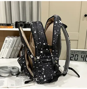 Black star pattern casual school backpack with spacious multi compartments for daily use.